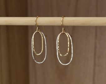 Oval Dangle Earrings with Gold and Silver Mixed Metals. Oval Hoop Drop Earrings with Hammered Surface. Unique, Artistic Earrings for Women.