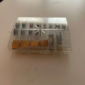 Vintage Sewing Accessories; Metal Bobbins; Plastic Spool Box; Tape Measure; Glass Jars with Needles; Sold as Set; 1950&#39;s Sewing Accessories