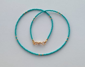 Handmade dainty summer jewelry: tiny turquoise beaded necklace, thin layered small necklace. Perfect for minimalist style.