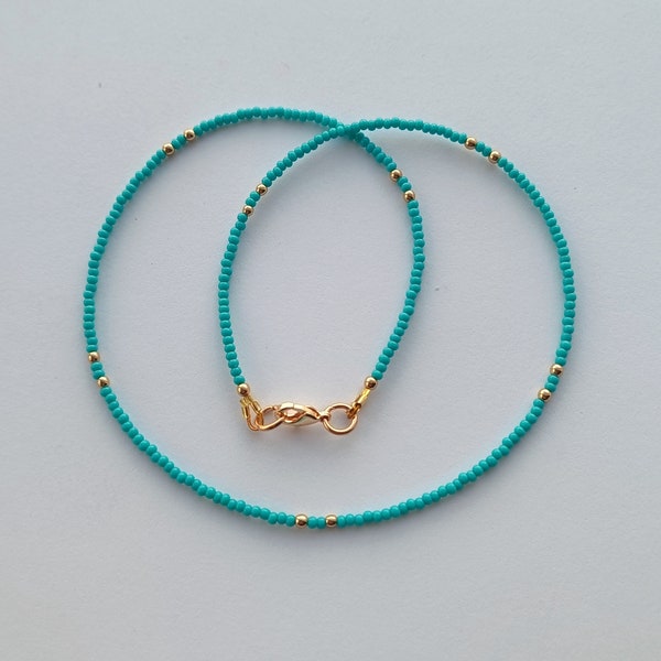 Handmade dainty summer jewelry: tiny turquoise beaded necklace, thin layered small necklace. Perfect for minimalist style.