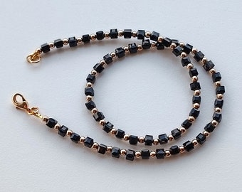 black cubes, crystals necklace with golden details