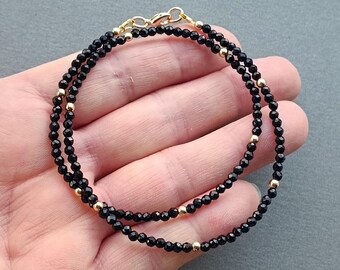 Elegant black onyx thin choker golden details