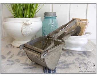 Antique french potato masher - country living
