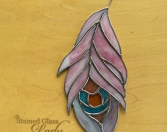 Handcrafted stained glass peacock feather suncatcher in pink and aqua, whimsical home decor, unique gift idea, window or wall hanging