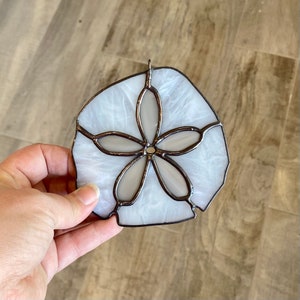 Handcrafted stained glass Sand dollar suncatcher in ivory and bronze, coastal home decor, gift idea, wedding favor, beachy window hanging