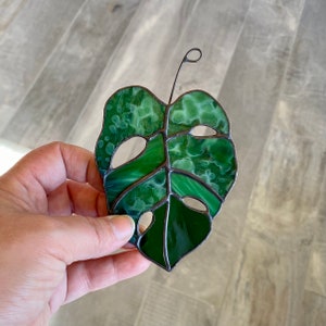Mini monstera leaf in deep emerald greens, stained glass suncatcher, handcrafted window hanging, nature home decor