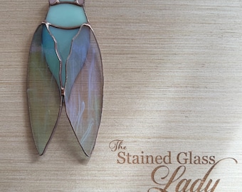 Handcrafted stained glass cicada beetle suncatcher in soft green iridescent, nature home decor