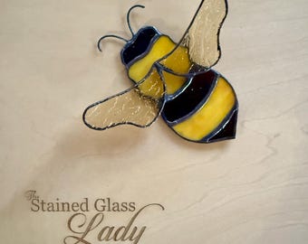 Handcrafted stained glass bumble bee suncatcher in marigold and brown, apiary window hanging or home decor