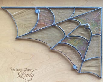 Handcrafted stained glass corner spiderweb in clear and iridescent, spooky Halloween home decor, seasonal suncatcher, unique gift idea