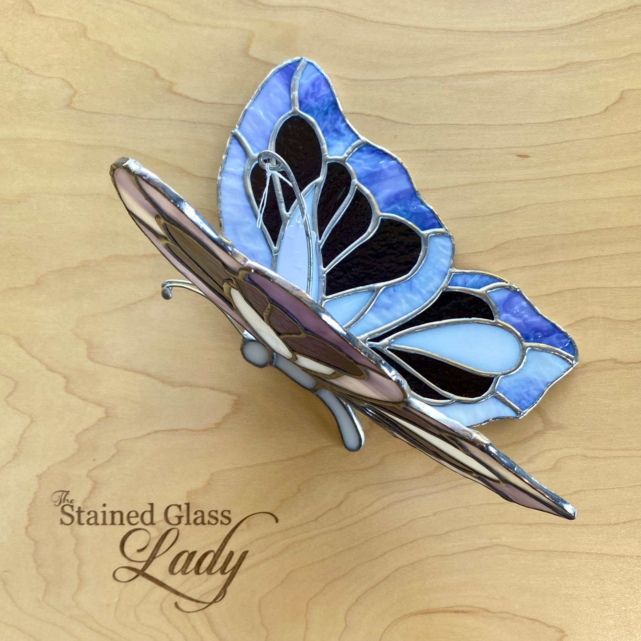 Handcrafted 3-dimensional stained glass butterfly suncatcher in purple and white, unique window or wall hanging, whimsical home decor, gift