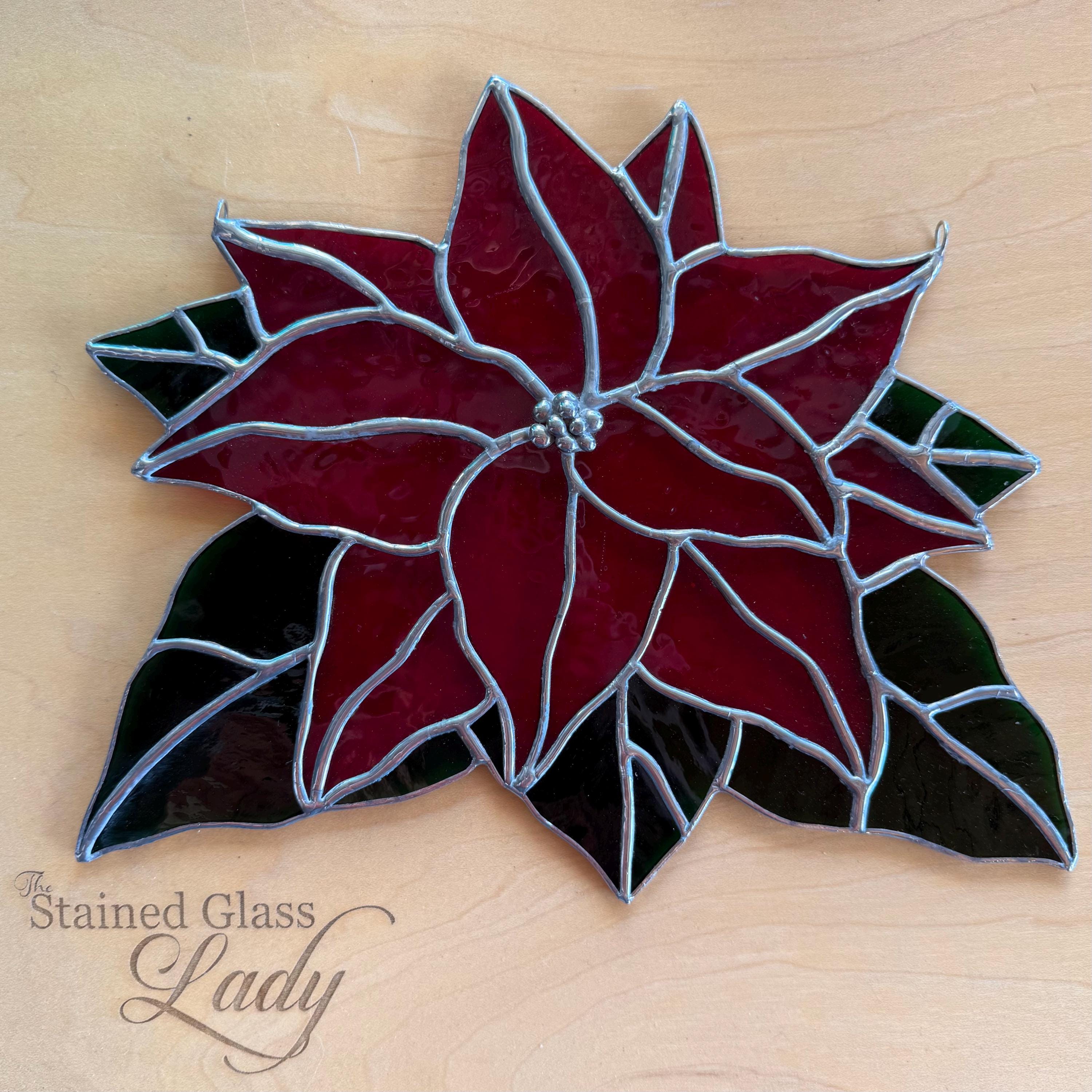 赤い大聖堂の手作りステンドグラスのクリスマスポインセチアサン