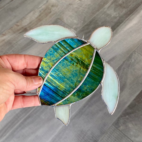 Handcrafted stained glass sea turtle suncatcher window hanging in iridescent green and ivory, beachy home decor, ocean gift idea