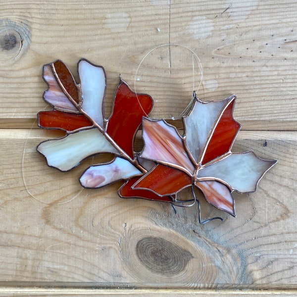 Handcrafted stained glass maple or oak leaf suncatcher in red orange and ivory, seasonal home decor, autumn window hanging, fall gift idea