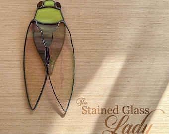 Handcrafted stained glass cicada beetle suncatcher in lime green and purple, entomology gift idea