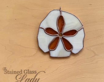 Handcrafted stained glass sand dollar in ivory and sunset orange, unique gift idea, beachy window hanging, coastal home decor