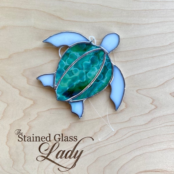 Handcrafted stained glass sea turtle suncatcher in dark green and light green mottled, beachy home decor, coastal gift idea, window hanging