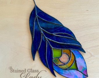 Handcrafted stained glass peacock feather suncatcher in blue green, unique home decor, whimsical window or wall hanging, nature gift idea