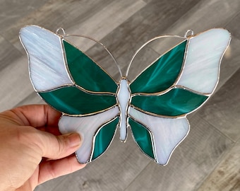 Handcrafted stained glass butterfly suncatcher in teal and white iridescent, nature home decor or window hanging, glass art gift idea