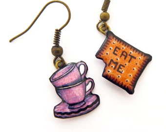 Alice in Wonderland earrings, stacked cups and "eat me" biscuit, bronze-coloured hooks