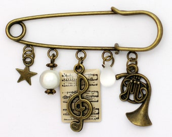 Broche épingle en laiton, thème musique, couleur bronze, partition de musique, cor d'harmonie, note de musique, étoile, perle nacrée