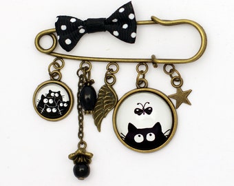 Broche épingle, chat noir, papillon, noir et blanc, perles de verre noires, aile, étoile, noeud noir à pois blancs