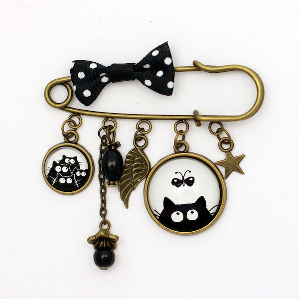 Broche épingle, chat noir, papillon, noir et blanc, perles de verre noires, aile, étoile, noeud noir à pois blancs