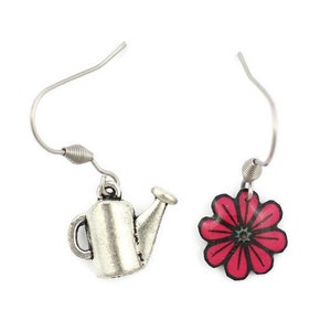 Mismatched earrings small pink flower and watering can