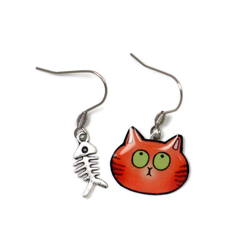 Mismatched earrings red cat and fishbone