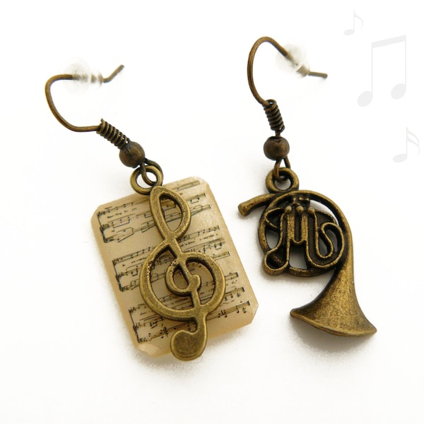 Boucles d'oreilles musique, partition et instrument de musique