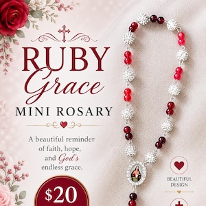 May include: A mini rosary featuring alternating deep red translucent beads and silver-toned beads encrusted with clear crystals. The rosary includes a central oval pendant depicting a religious figure and a silver-toned cross at the bottom end.