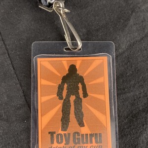 Toy Guru Convention Badge :: Back