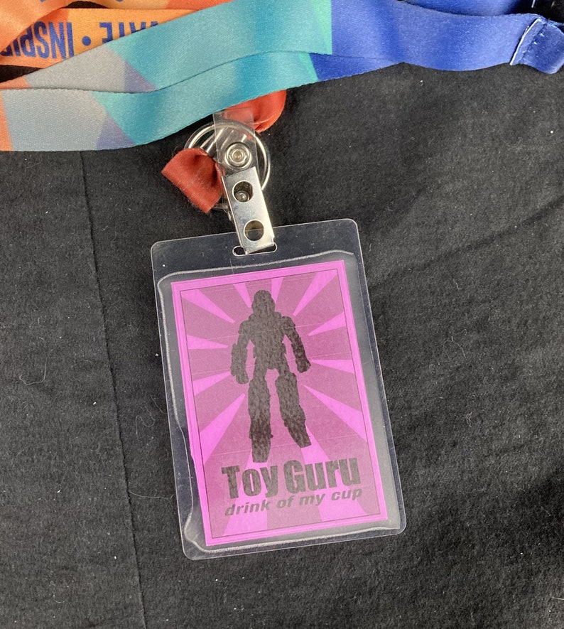 Toy Guru Convention Badge :: Back