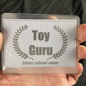 トイ・グルのウォレットカードとコンベンションバッジ