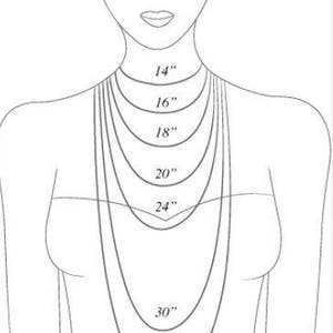 May include: A line drawing of a person's torso showing different necklace lengths in inches, from 14 inches to 33 inches.