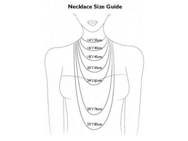 May include: A diagram showing different necklace lengths in inches and centimeters. The lengths are 14 inches (35 cm), 16 inches (40 cm), 18 inches (45 cm), 20 inches (50 cm), 24 inches (61 cm), 30 inches (76 cm), and 33 inches (83 cm).
