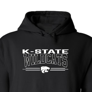 May include: Black hooded sweatshirt with white text that reads "K-STATE WILDCATS" and a white mascot logo.