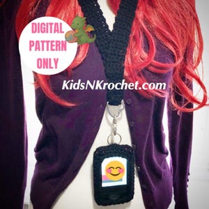 May include: Black crocheted lanyard with a matching phone case. The phone case displays a smiling emoji. The image also includes the text "DIGITAL PATTERN ONLY" and "KidsNKrochet.com".