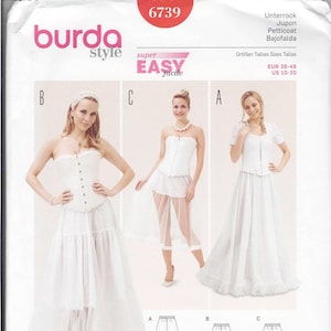 May include: A Burda Style sewing pattern featuring three white corset tops and skirts. The pattern includes illustrations of the garments and the text "super EASY facile". The pattern is for sizes EUR 36-46 and US 10-20.