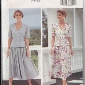 May include: A vintage Butterick sewing pattern featuring two women modeling outfits. The pattern includes a skirt and jacket, with the text "RONNIE HELLER MJ" and size information. The outfits are a light gray suit and a floral print suit.