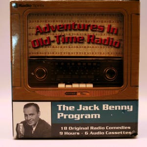 May include: A box set titled "Adventures in Old-Time Radio" featuring a vintage radio design. The box includes "The Jack Benny Program" with 18 original radio comedies, 9 hours of content, and 6 audio cassettes. A black and white photo of Jack Benny is on the box.