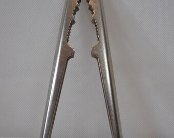 vintage French metal nut cracker