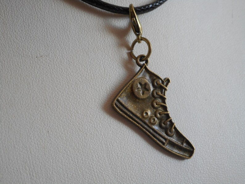 stunning hand made necklace and bronze coloured metal pendant