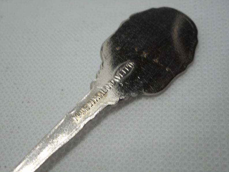 stunning vintage Dutch collectable silver plated metal spoon