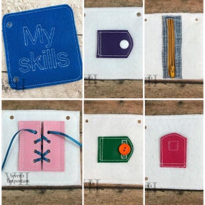 Op de afbeelding: Een activiteitenbord van vilt met de tekst "My Skills" op een blauw vierkant. Het bord heeft vijf verschillende activiteiten: een rits, een knoop, een veteractiviteit, een drukknoop en een klittenband.