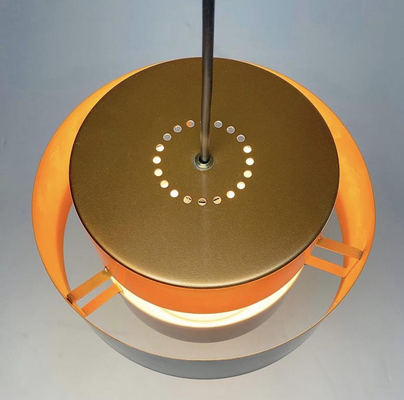 Close up of top of Classic danish Juno copper ceiling light by Jo Hammerborg for Fog and Morup, Denmark 1966.