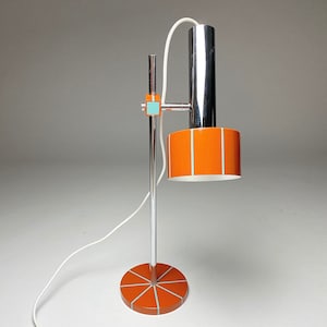 Vintage space age  orange table or desk lamp by Gundert AG, Germany 1970s.