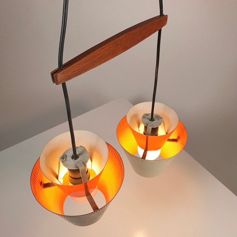 Closeup teak 
Danish mid century copper ceiling light made in 1960s.