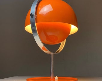 Vintage Moonlight table lamp in orange lacquer by Buch & Jørgensen, Denmark 1963.