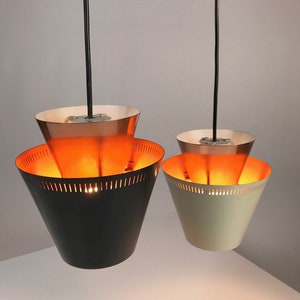 Closeup of 
Danish mid century copper ceiling light made in 1960s.