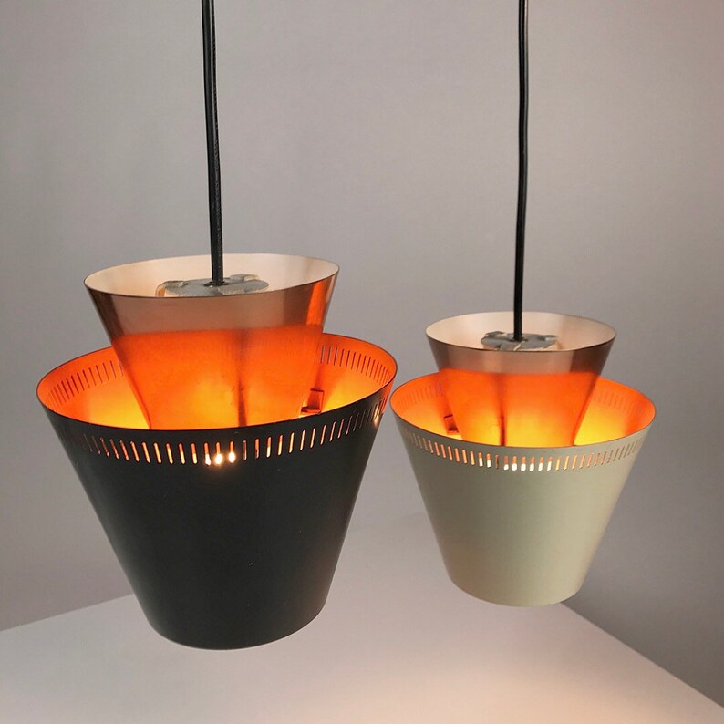 Closeup of 
Danish mid century copper ceiling light made in 1960s.